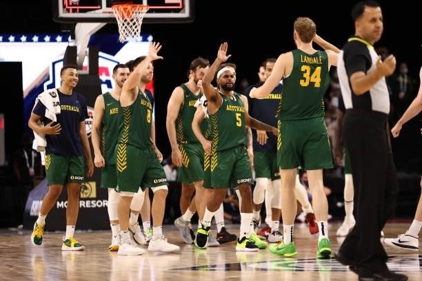 Patty Mills of the Australia Men's National Team and teammates celebrate after the game against the Argentina Men's National Team on July 10, 2021 at...