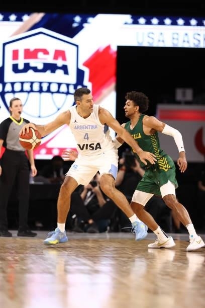 Matisse Thybulle of the Australia Men's National Team plays defense on Luis Scola of the Argentina Men's National Team during the game on July 10,...