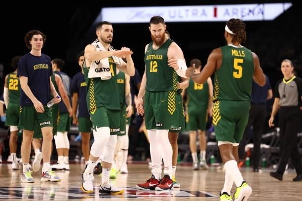Patty Mills of the Australia Men's National Team celebrates with teammates during the game against the Argentina Men's National Team on July 10, 2021...