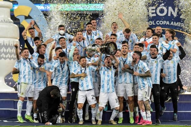 Argentina's players celebrate the title of champion during an awards ceremony after their victory against Brazil in a match at the Maracana stadium...