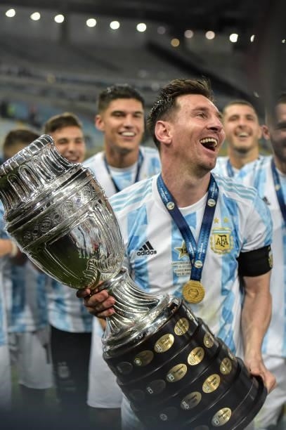 Messi, an Argentine player celebrates the title of champion after the match against Brazil, at the Maracana stadium, for the decision of the Copa...