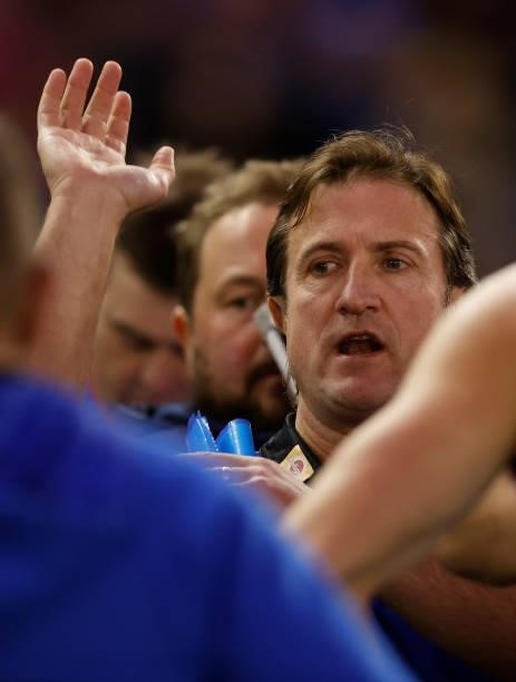 Senior coach Luke Beveridge of the Bulldogs addresses his players during the 2021 AFL Round 17 match between the Western Bulldogs and the Sydney...
