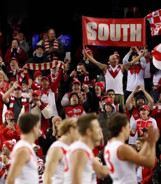 Swans fans celebrate during the 2021 AFL Round 17 match between the Western Bulldogs and the Sydney Swans at Marvel Stadium on July 11, 2021 in...