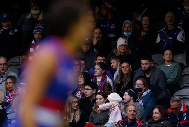 Mia and Brendan Fevola look on as Jamarra Ugle-Hagan of the Bulldogs is seen during the 2021 AFL Round 17 match between the Western Bulldogs and the...