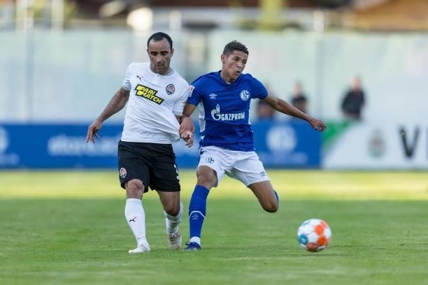 Vitao of Shakhtar Donetsk and Amine Harit of FC Schalke 04 battle for the ball during the Pre-Season Friendly match between FC Schalke 04 and...