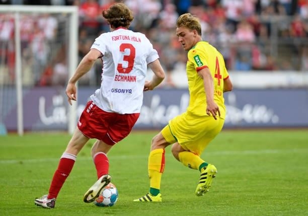 Soeren Dieckmann of Fortuna Koeln and Timo Huebers of 1. FC Koeln battle for the ball during the Pre-Season Friendly match between Fortuna Koeln and...