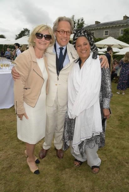 Janet Astor, Duchess of Richmond,, Charles Gordon-Lennox, Duke of Richmond, and sister Nimmy March attend Cartier Style Et Luxe at the Goodwood...