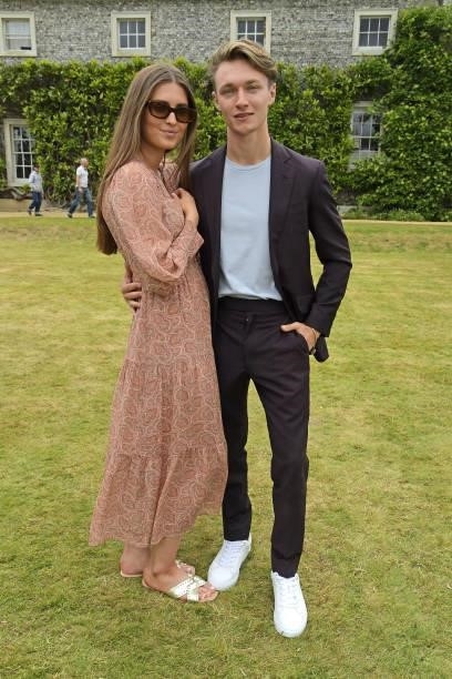 Gracie James and Harrison Osterfield attend Cartier Style Et Luxe at the Goodwood Festival Of Speed at Goodwood Racecourse on July 11, 2021 in...