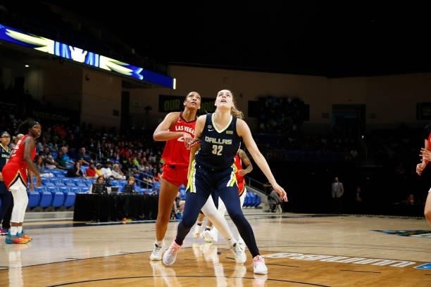 Bella Alarie of the Dallas Wings and A'ja Wilson of the Las Vegas Aces look up on July 11, 2021 at the College Park Center in Arlington, TX. NOTE TO...