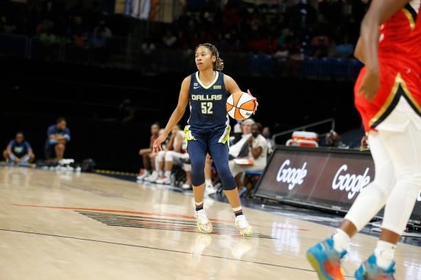 Tyasha Harris of the Dallas Wings handles the ball against the Las Vegas Aces on July 11, 2021 at the College Park Center in Arlington, TX. NOTE TO...