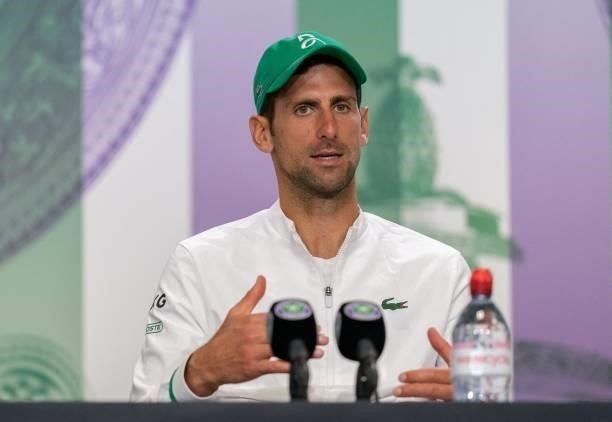 Serbia's Novak Djokovic attends a press conference after winning his men's singles final match against Italy's Matteo Berrettini on the thirteenth...