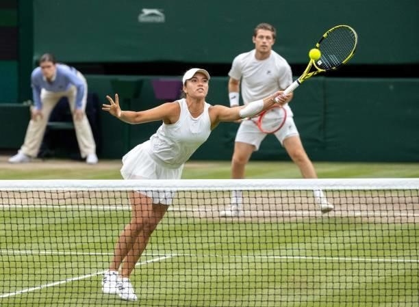 Britain's Neal Skupski and US player Desirae Krawczyk play a point against Britain's Joe Salisbury and Harriet Dart during their mixed doubles final...