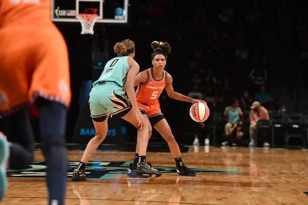 Jasmine Thomas of the Connecticut Sun handles the ball against the New York Liberty on July 11, 2021 at the Barclays Center in Brooklyn, New York....