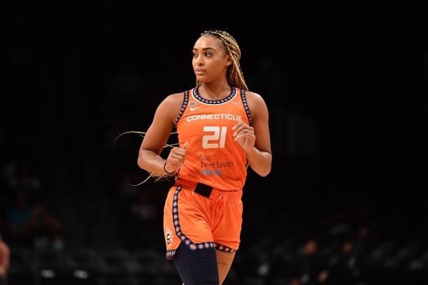 DiJonai Carrington of the Connecticut Sun looks on during the game against the New York Liberty on July 11, 2021 at the Barclays Center in Brooklyn,...