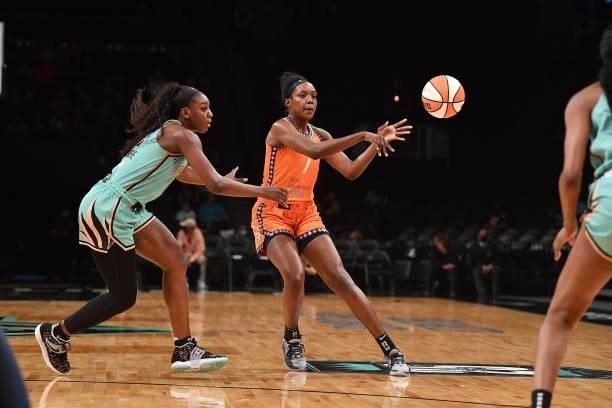 Beatrice Mompremier of the Connecticut Sun passes the ball during the game against the New York Liberty on July 11, 2021 at the Barclays Center in...
