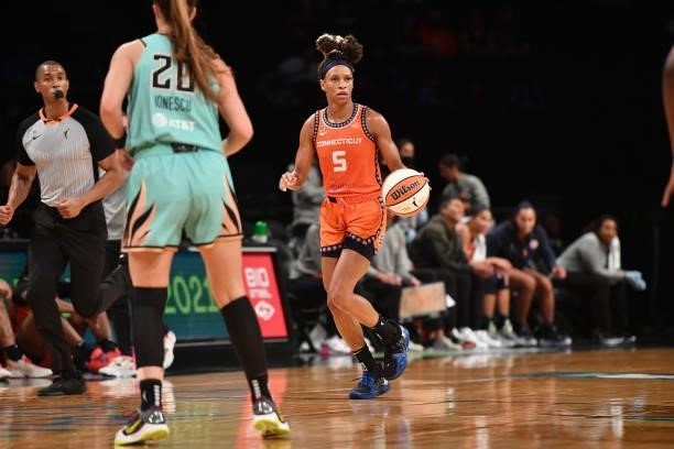 Jasmine Thomas of the Connecticut Sun dribbles the ball against the New York Liberty on July 11, 2021 at the Barclays Center in Brooklyn, New York....