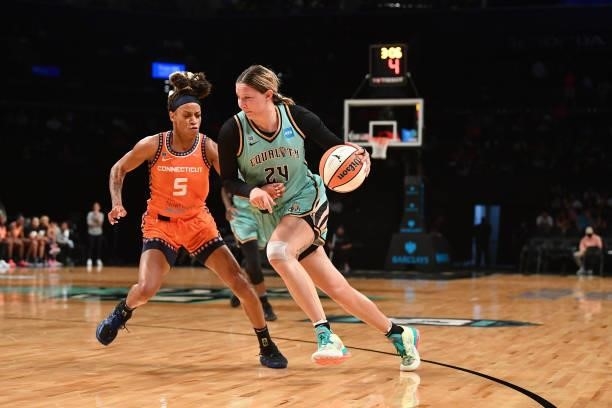 Kylee Shook of the New York Liberty drives to the basket against the Connecticut Sun on July 11, 2021 at the Barclays Center in Brooklyn, New York....