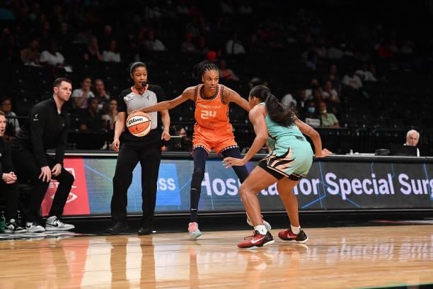 Betnijah Laney of the New York Liberty plays defense on DeWanna Bonner of the Connecticut Sun on July 11, 2021 at the Barclays Center in Brooklyn,...