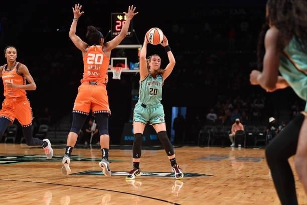 Sabrina Ionescu of the New York Liberty looks to pass the ball during the game against the Connecticut Sun on July 11, 2021 at the Barclays Center in...