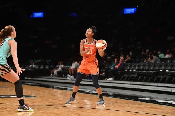 Briann January of the Connecticut Sun handles the ball against the New York Liberty on July 11, 2021 at the Barclays Center in Brooklyn, New York....