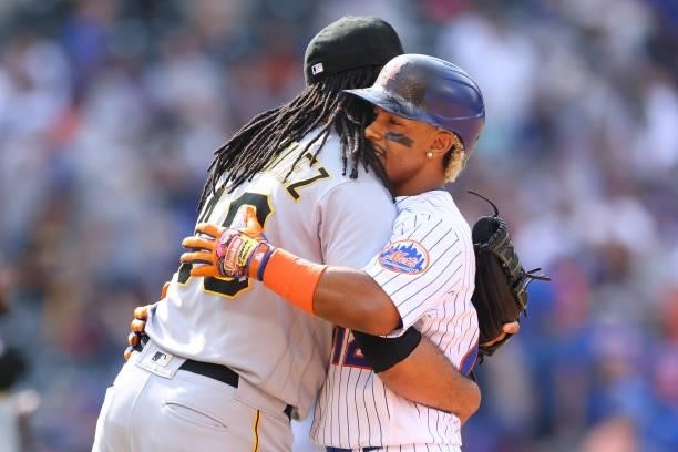 Closer Richard Rodriguez of the Pittsburgh Pirates hugs Francisco Lindor of the New York Mets after the Pirates defeated the Mets 6-5 at Citi Field...
