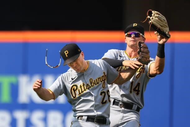 Second baseman Adam Frazier and right fielder Jared Oliva of the Pittsburgh Pirates collide after Oliva makes the catch on a ball hit by Francisco...