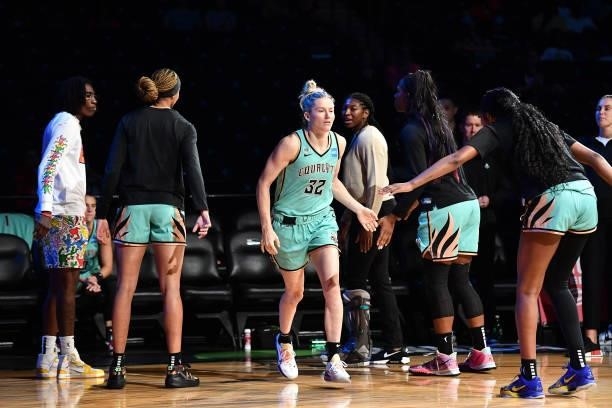 Sami Whitcomb of the New York Liberty high fives teammates before the game against the Connecticut Sun on July 11, 2021 at the Barclays Center in...