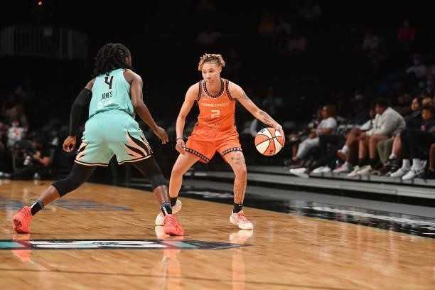 Jazmine Jones of the New York Liberty plays defense on Natisha Hiedeman of the Connecticut Sun on July 11, 2021 at the Barclays Center in Brooklyn,...