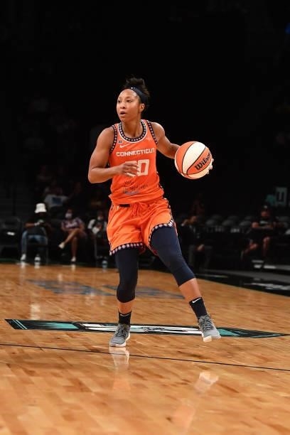 Briann January of the Connecticut Sun handles the ball against the New York Liberty on July 11, 2021 at the Barclays Center in Brooklyn, New York....