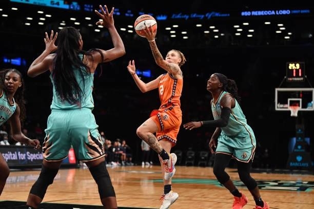 Natisha Hiedeman of the Connecticut Sun drives to the basket against the New York Liberty on July 11, 2021 at the Barclays Center in Brooklyn, New...