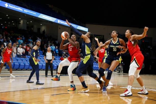 Chelsea Gray of the Las Vegas Aces looks to shoot the ball against the Dallas Wings on July 11, 2021 at the College Park Center in Arlington, TX....