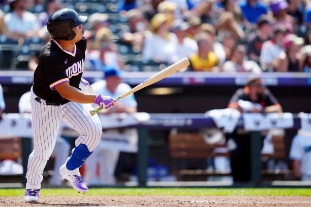 Francisco Alvarez of the National League Team hits a solo home run in the sixth inning during the 2021 Sirius XM Futures Game at Coors Field on...
