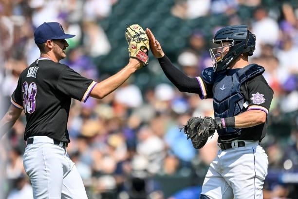 Ethan Small celebrates the 8-3 win over the American League Futures Team with Willie Maclver of National League Futures Team at Coors Field on July...
