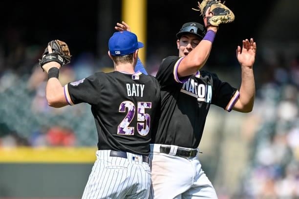 Brett Baty and Michael Toglia of National League Futures Team celebrate after an 8-3 win over the American League Futures Team at Coors Field on July...