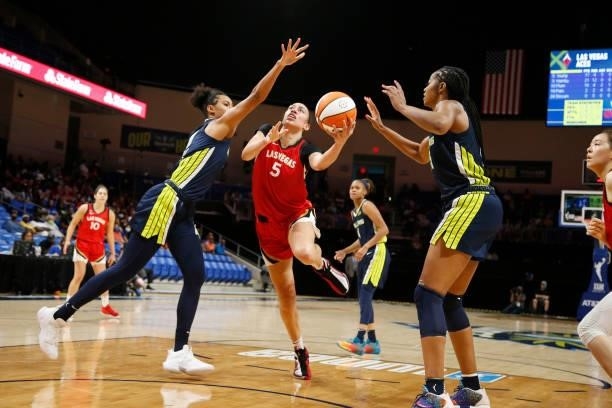 Dearica Hamby of the Las Vegas Aces drives to the basket against the Dallas Wings on July 11, 2021 at the College Park Center in Arlington, TX. NOTE...