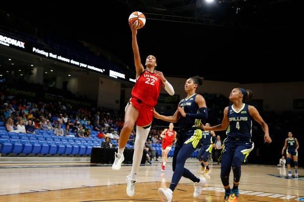 Ja Wilson of the Las Vegas Aces drives to the basket against the Dallas Wings on July 11, 2021 at the College Park Center in Arlington, TX. NOTE TO...