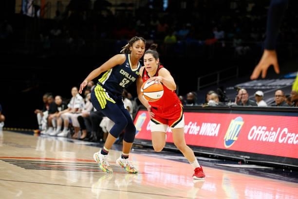 Kelsey Plum of the Las Vegas Aces dribbles the ball against the Dallas Wings on July 11, 2021 at the College Park Center in Arlington, TX. NOTE TO...