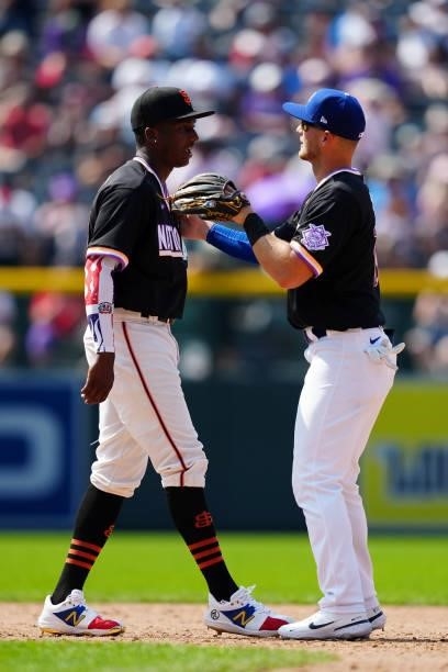 Marco Luciano and Michael Busch of the National League Team celebrate after the during the 2021 Sirius XM Futures Game at Coors Field on Sunday, July...
