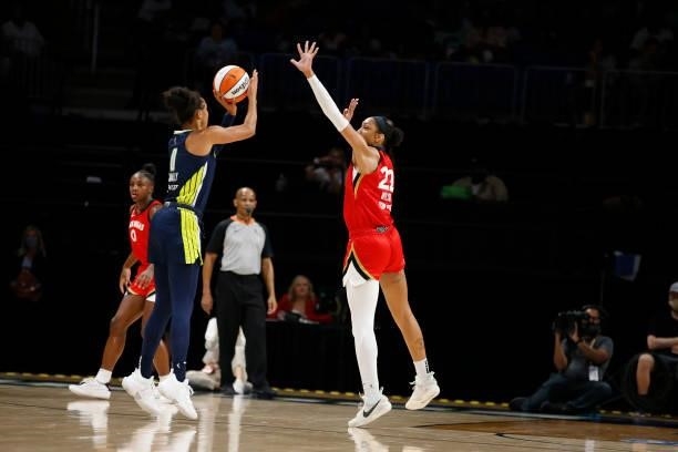 Satou Sabally of the Dallas Wings shoots the ball over A'ja Wilson of the Las Vegas Aces on July 11, 2021 at the College Park Center in Arlington,...