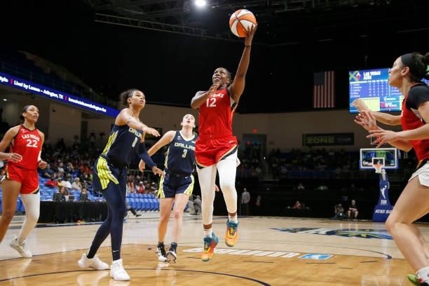Chelsea Gray of the Las Vegas Aces drives to the basket against the Dallas Wings on July 11, 2021 at the College Park Center in Arlington, TX. NOTE...