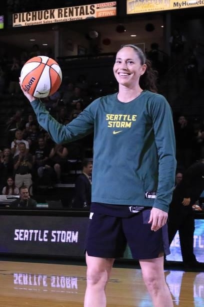 Sue Bird of the Seattle Storm is presented with a ball to recognize becoming the first WNBA player in history to reach 3,000 career assists before...