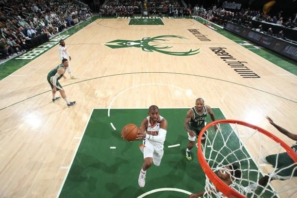 Chris Paul of the Phoenix Suns shoots the ball against the Milwaukee Bucks during Game Three of the 2021 NBA Finals on July 11, 2021 at the Fiserv...