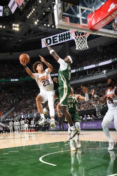 Cameron Johnson of the Phoenix Suns drives to the basket during the game against the Milwaukee Bucks during Game Three of the 2021 NBA Finals on July...