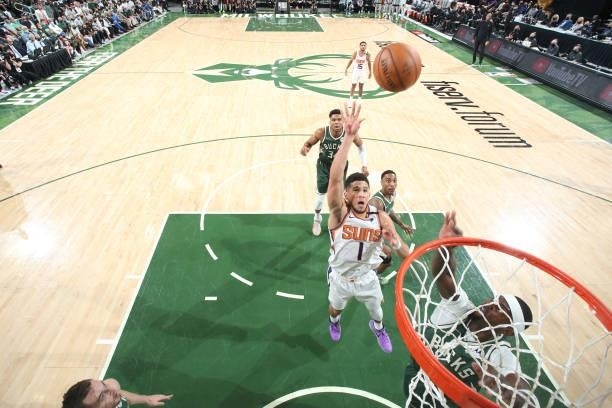 Devin Booker of the Phoenix Suns shoots the ball against the Milwaukee Bucks during Game Three of the 2021 NBA Finals on July 11, 2021 at the Fiserv...