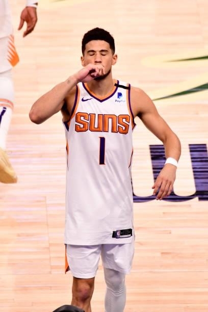 July 11: Devin Booker of the Phoenix Suns warms up prior to the game against the Milwaukee Bucks during Game Three of the 2021 NBA Finals on July 11,...