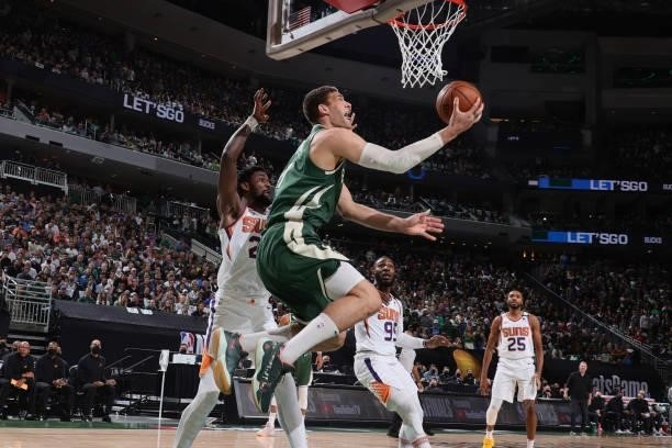 Brook Lopez of the Milwaukee Bucks shoots the ball against the Phoenix Suns during Game Three of the 2021 NBA Finals on July 11, 2021 at the Fiserv...