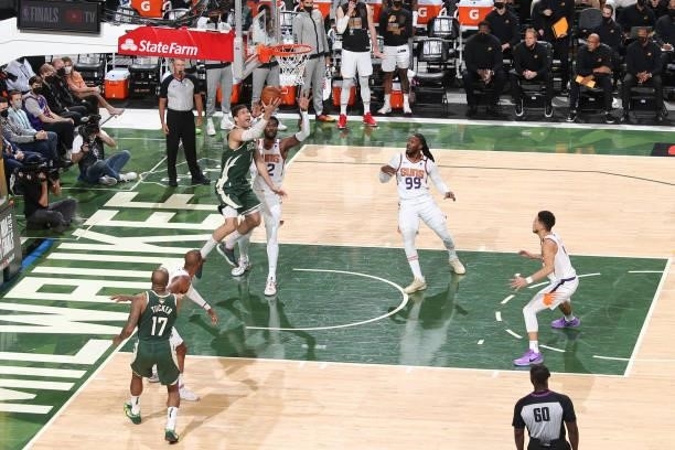 Brook Lopez of the Milwaukee Bucks shoots the ball during the game against the Phoenix Suns during Game Three of the 2021 NBA Finals on July 11, 2021...