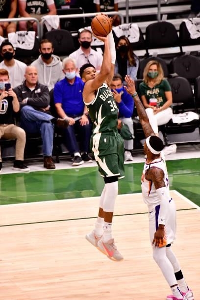 July 11: Giannis Antetokounmpo of the Milwaukee Bucks shoots the ball against the Phoenix Suns during Game Three of the 2021 NBA Finals on July 11,...