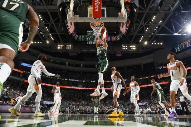 Giannis Antetokounmpo of the Milwaukee Bucks dunks the ball during the game against the Phoenix Suns during Game Three of the 2021 NBA Finals on July...