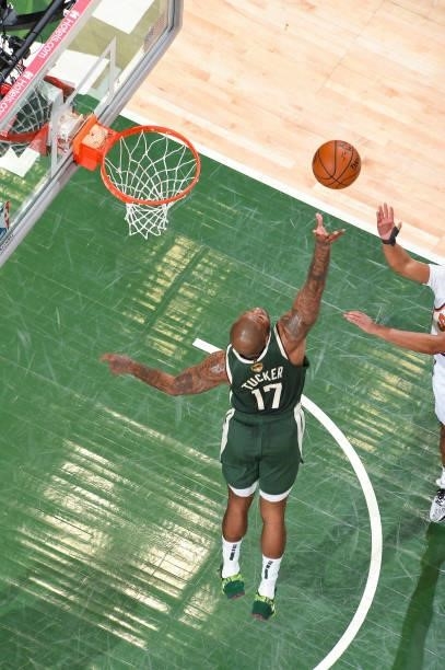 Tucker of the Milwaukee Bucks fights for the rebound during the game against the Phoenix Suns during Game Three of the 2021 NBA Finals on July 11,...